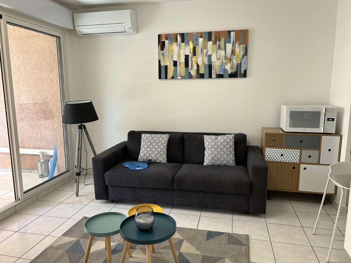 Appartement cosy à Port Fréjus: climatisé, proche plage, commerces et garage - 4 couchages - Chambres d'hôtes Fréjus