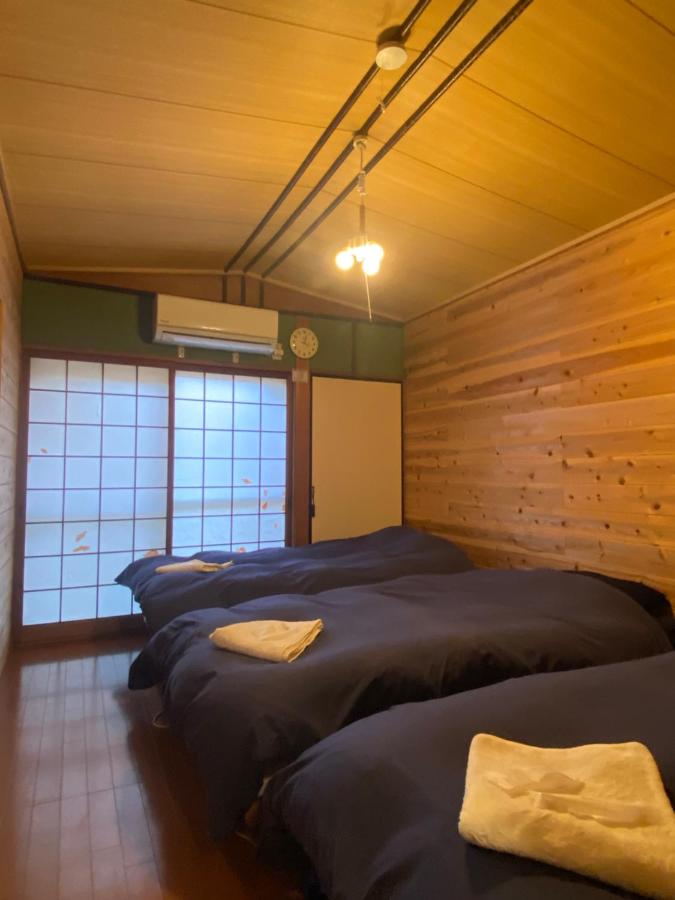 Chambre Triple avec Salle de Bains Commune