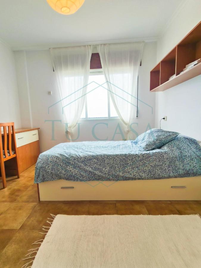 Four-Bedroom Apartment with Balcony 