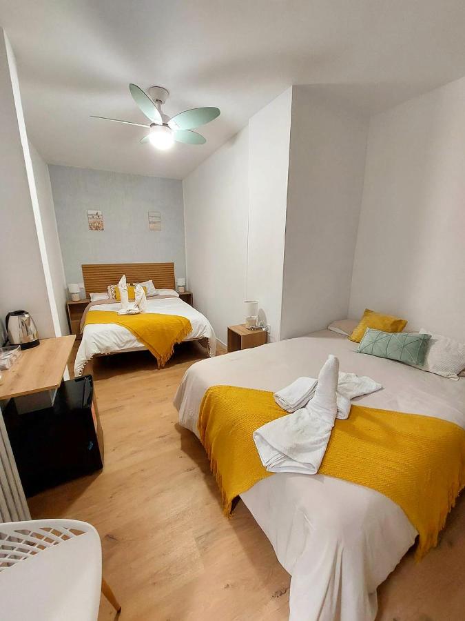 Quadruple Room with Shared Bathroom