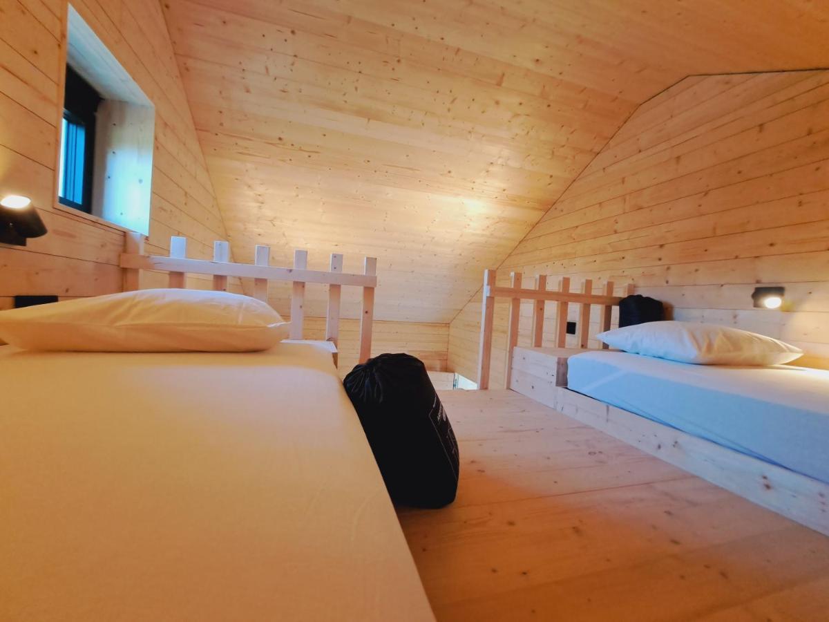 Cama individual en habitación compartida