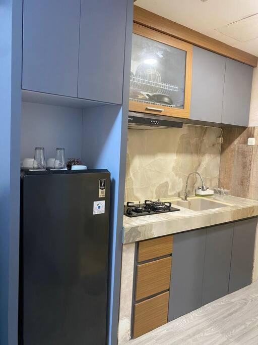 Apartment Bale Hinggil Deluxe Studio - Ferienwohnung Surabaya
