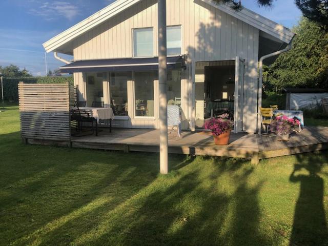 Havsnära arkitektritad stuga i Ölmanäs, Gårda brygga - Ferienwohnung