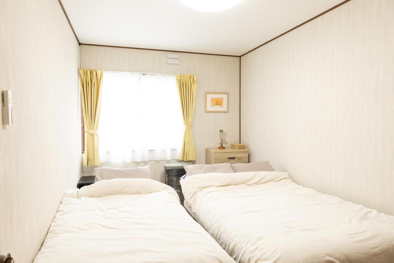 Double or Twin Room with Shared Bathroom