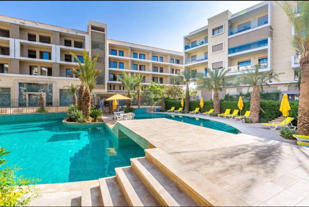 Appartement Luxueux avec Piscine 10 minutes du centre ville - Chambres d'hôtes Marrakech