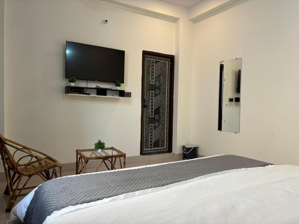 Chambre Double Deluxe (2 Adultes + 1 Enfant)