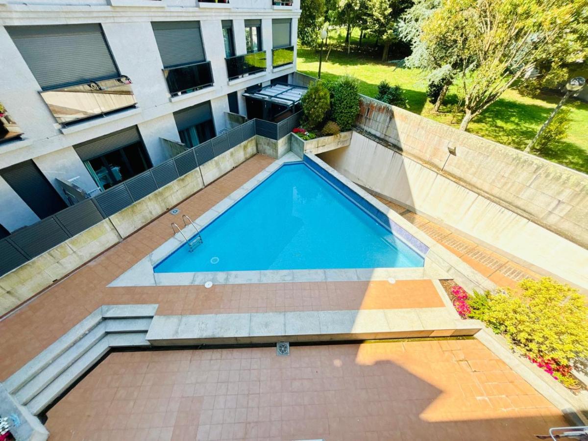 Holibai Cousiña, Coqueto Apartamento con Piscina - B&B Baiona
