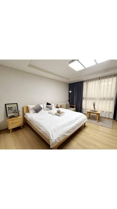 D' Heights Monterrace Lake Condo - Chambres d’hôtes Mabalacat City
