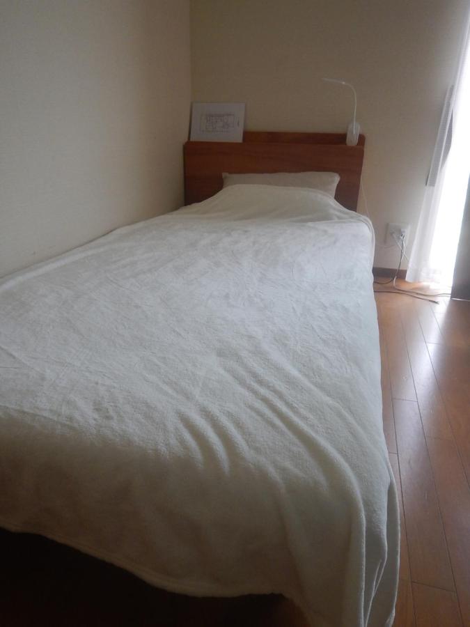 Single Bed in Female Dormitory Room