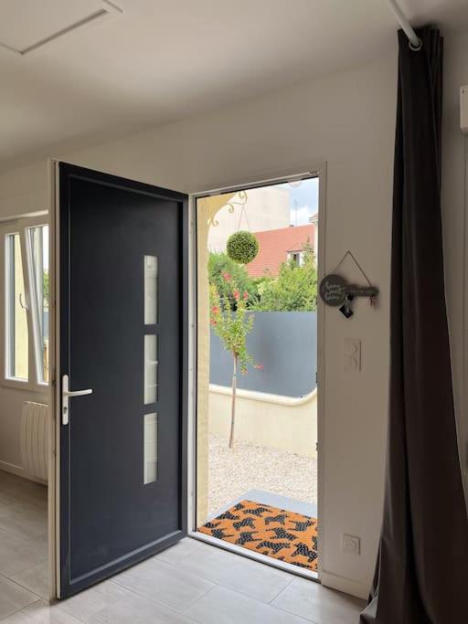 Le cocon, studio de 30m2 avec jardin et parking privatifs près de paris et Disney - B&B