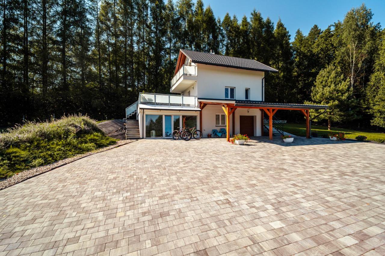 Domek przy Modrzewiach - B&B