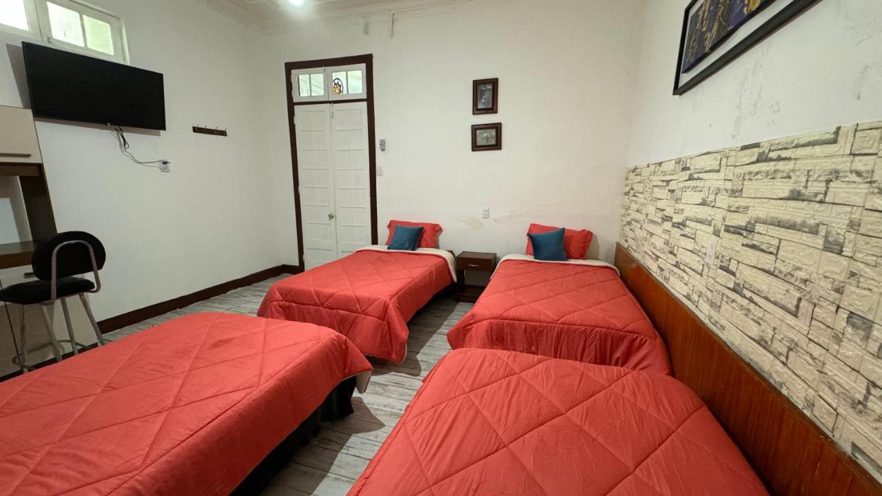 Habitación Cuádruple Económica con baño compartido