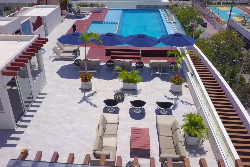 Beautiful Roof top Pool & Gym with Ocean views! - B&B Playa del Carmen
