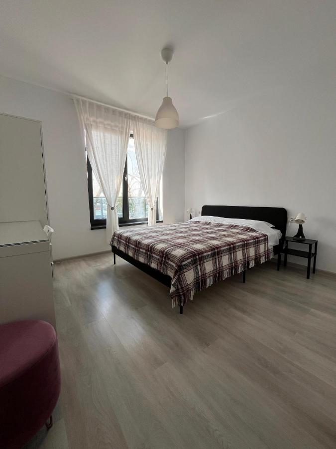 One-Bedroom Apartment with Balcony and City View