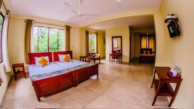 Chambre Triple avec Salle de Bains Privative