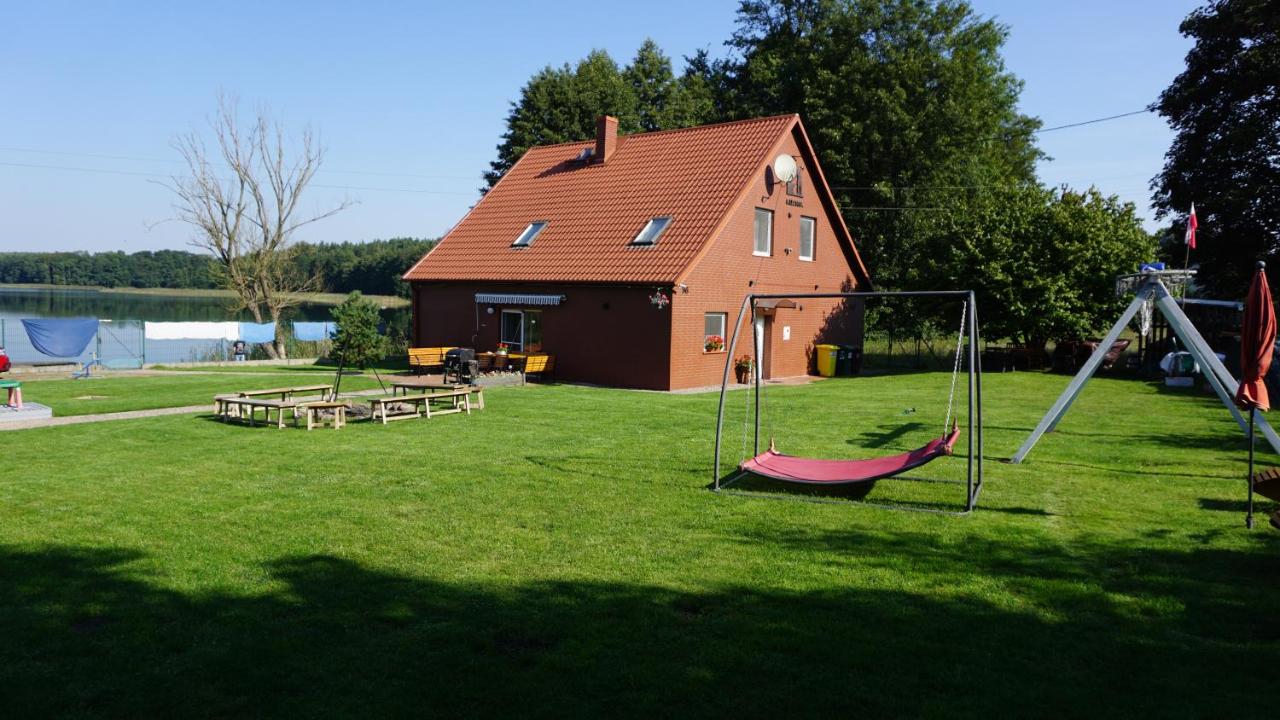 DOM NAD JEZIOREM KUŹNIa - Chambres d’hôtes Łąkie