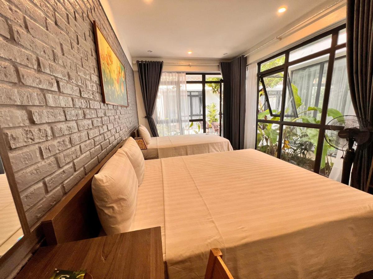Habitación Triple con vistas al jardín
