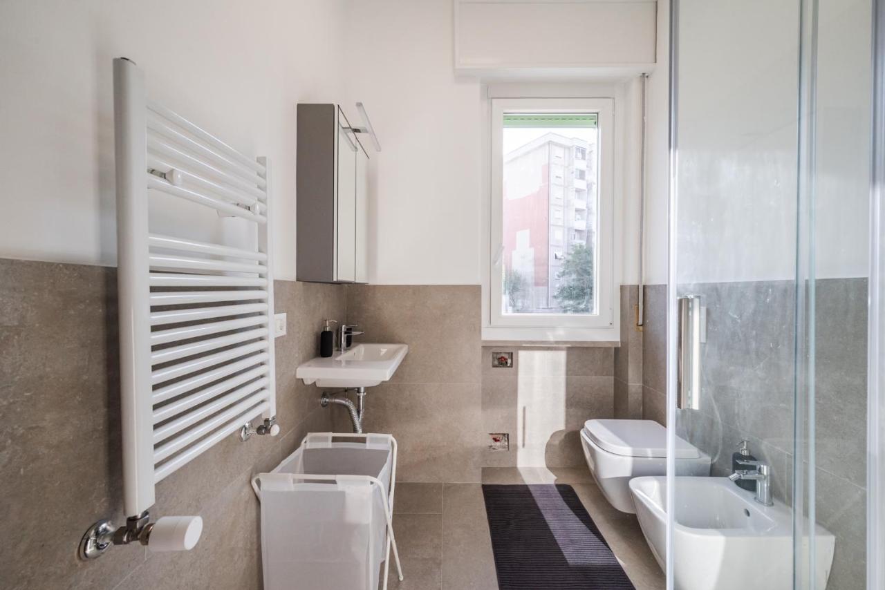 Camera Doppia con Letti Singoli e Bagno in Comune