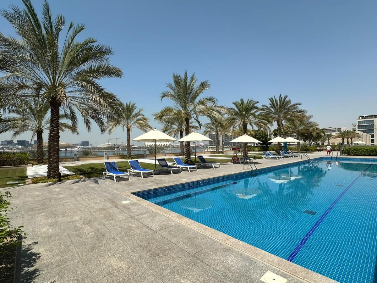 2BR - Al Zeina Beach Community, Al Raha Beach - 5 minutes from Zayed Int'l airport, Yas Island, Etihad Arena, Etihad Park - Chambres d’hôtes Abou Dabi