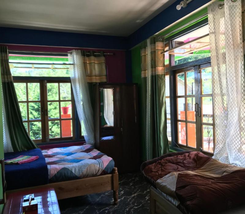 Chambre Triple – Vue sur Montagne