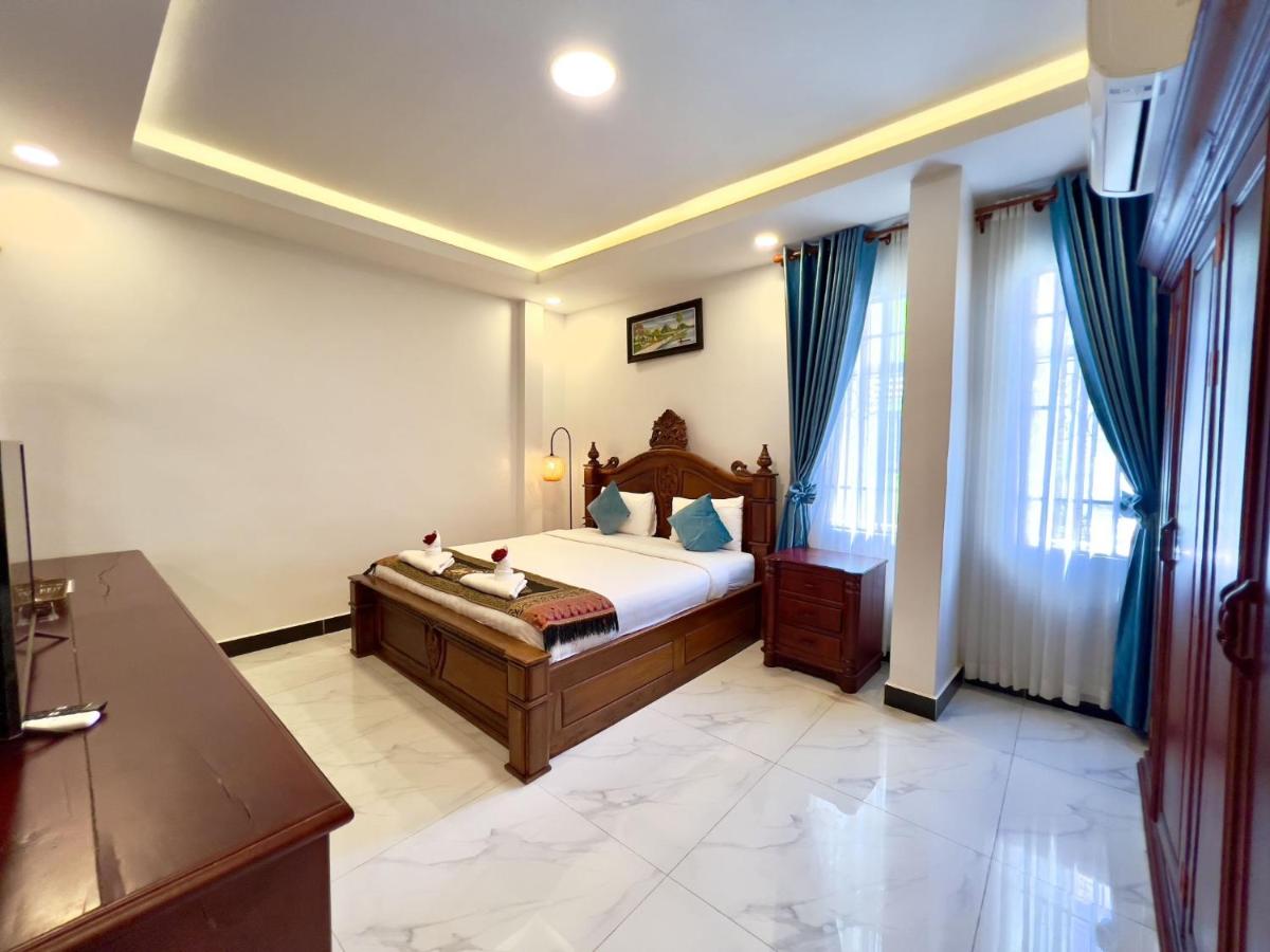 Chambre Lit Queen-Size Deluxe