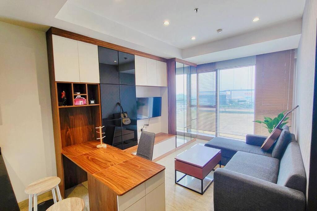 1BR Premium Branz BSD Apartment by OWARI - B&B