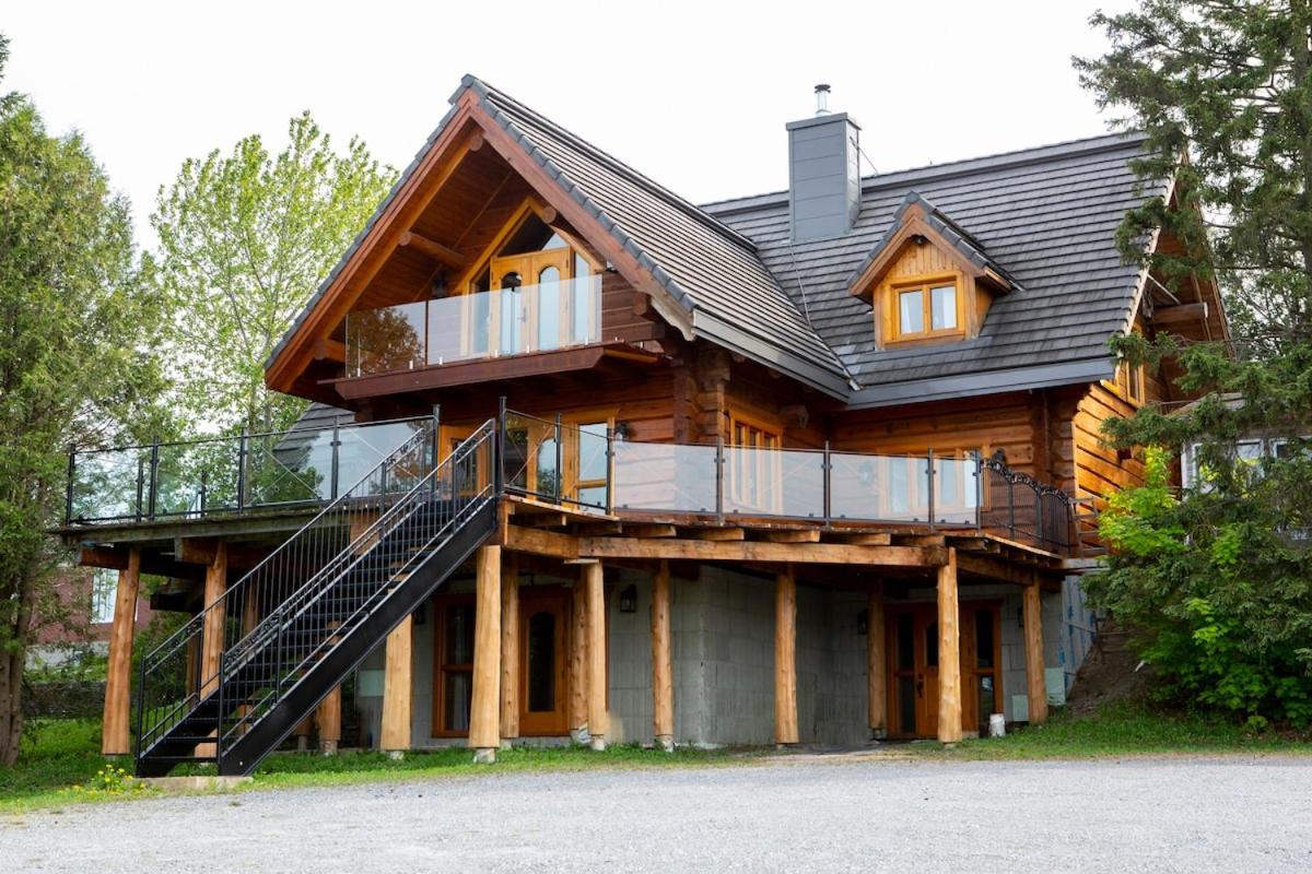 Hébergement "La Maison en Bois Rond" - Ferienwohnung Sainte-Marie