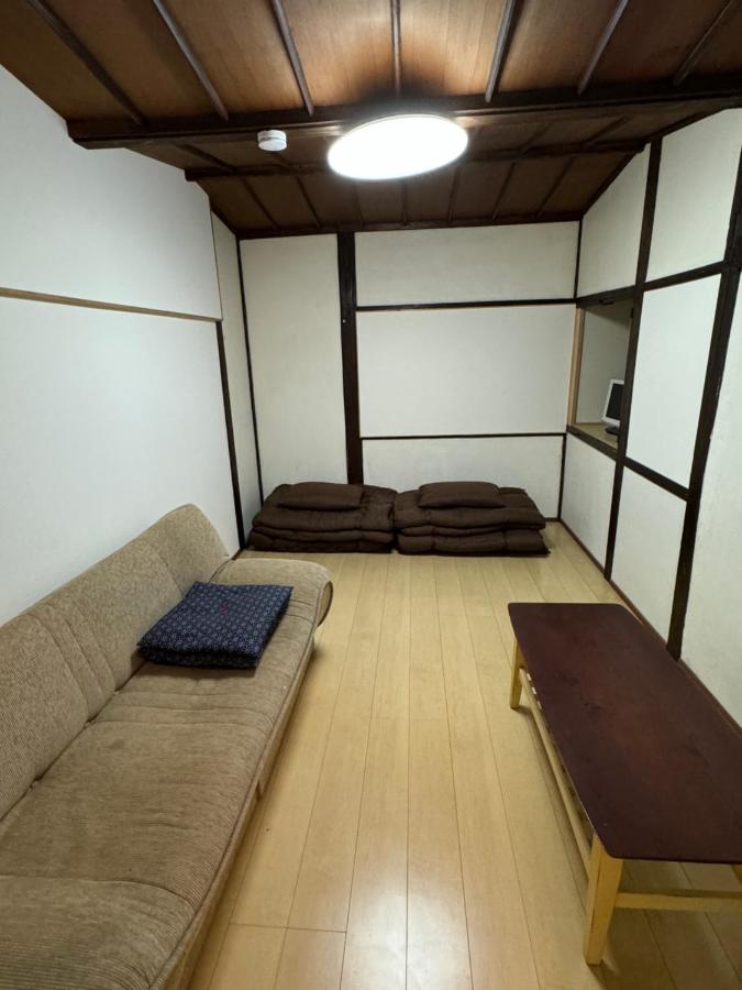 Camera Tripla con Bagno in Comune