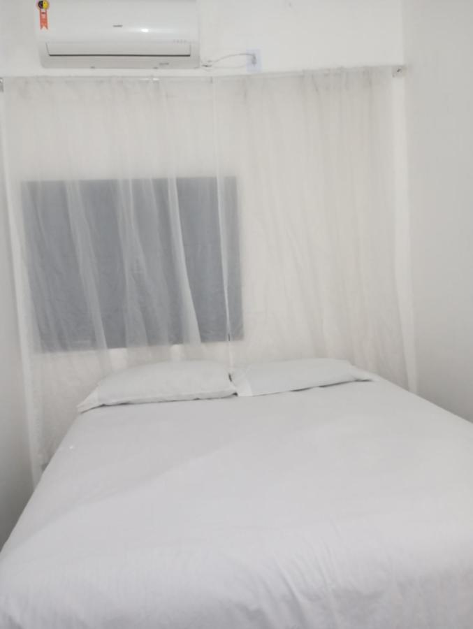Suíte Casa Central Garagem Hatch - B&B