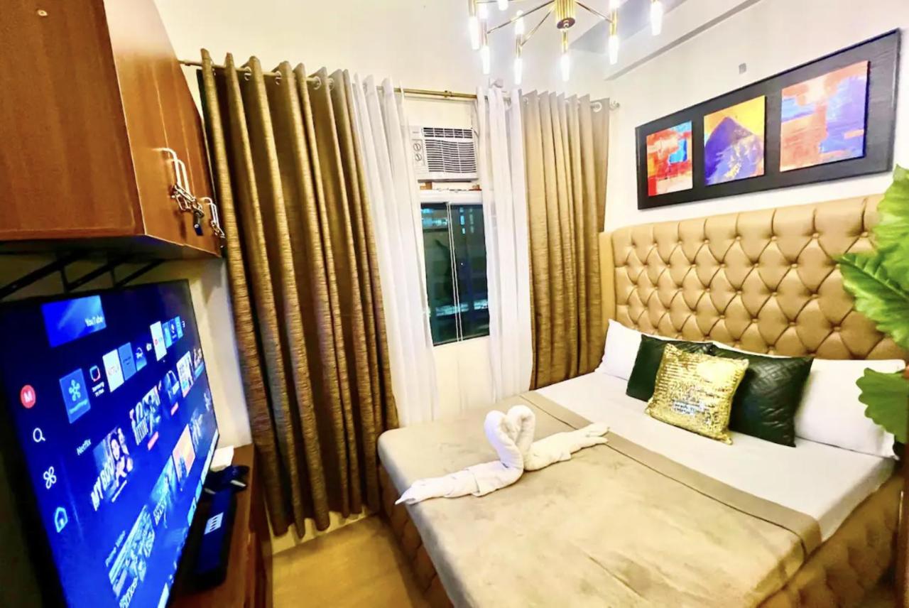 300 Mbps WiFi - 55 inch SMART TV - Alabang condo near Bellevue Hotel Filinvest City - Ferienwohnung