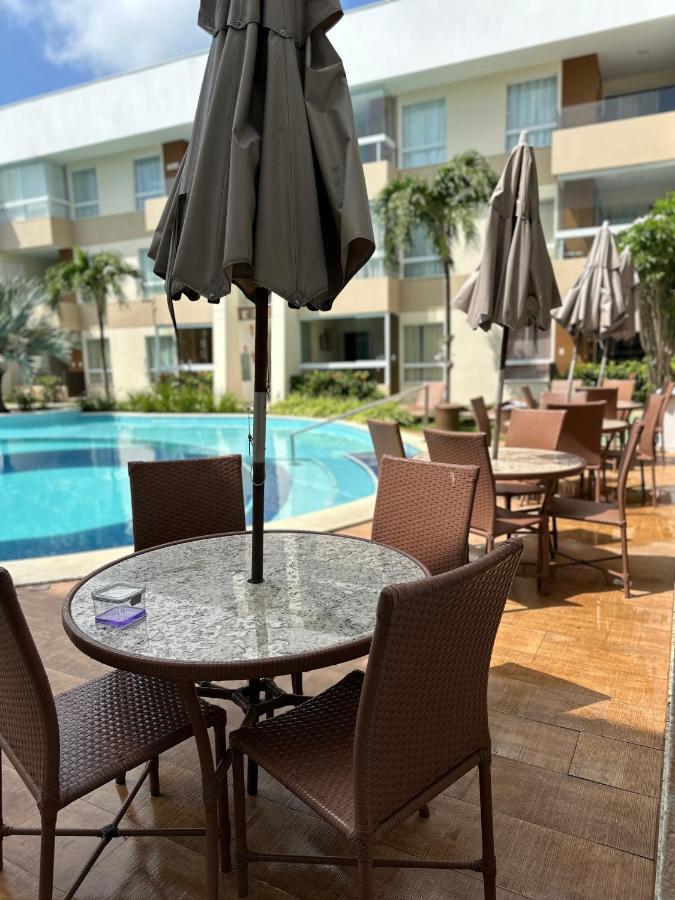 Apt hotel praia Guarajuba condominio Porto Smeralda praia excluisiva - Chambres d'hôtes Guarajuba
