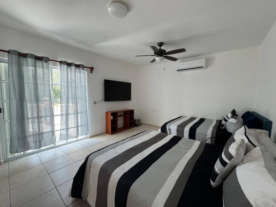 Suites Amplias en Quinta Avenida - B&B Playa del Carmen
