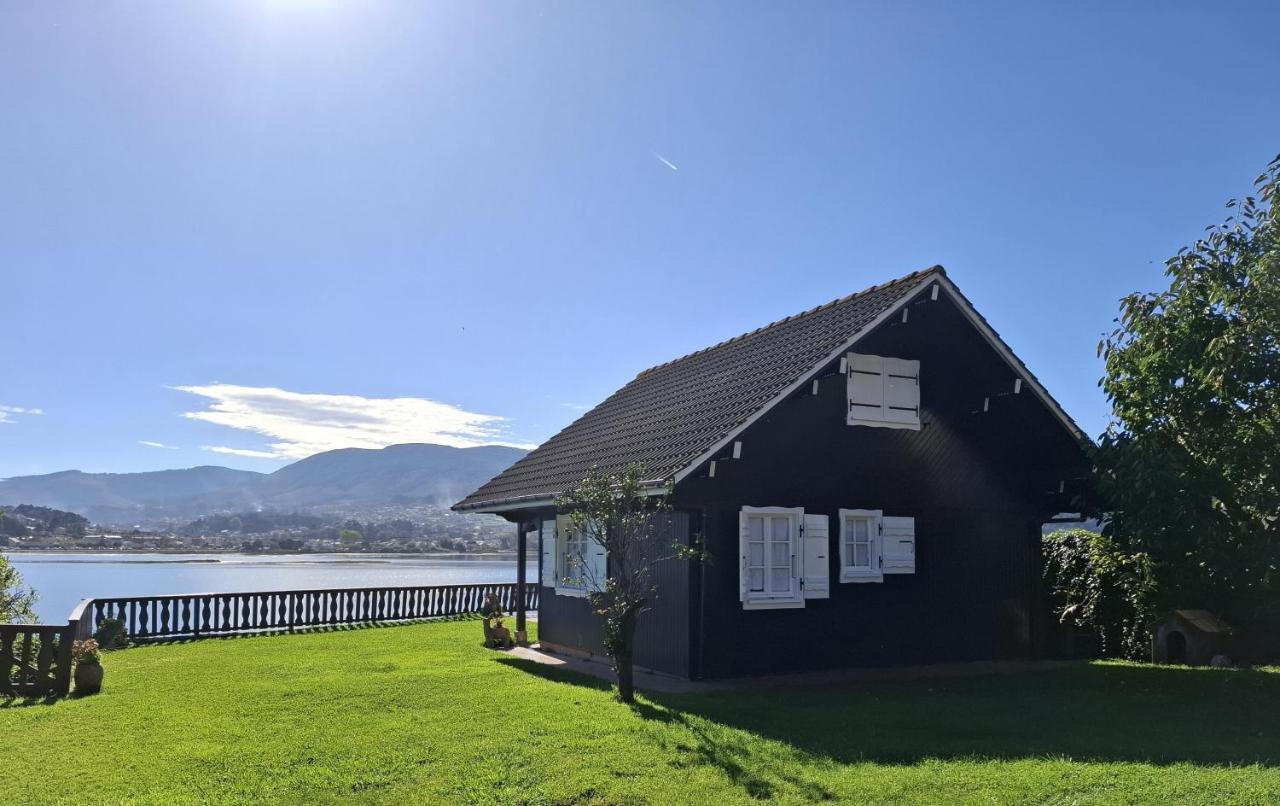 Casa de madera sobre el mar - B&B