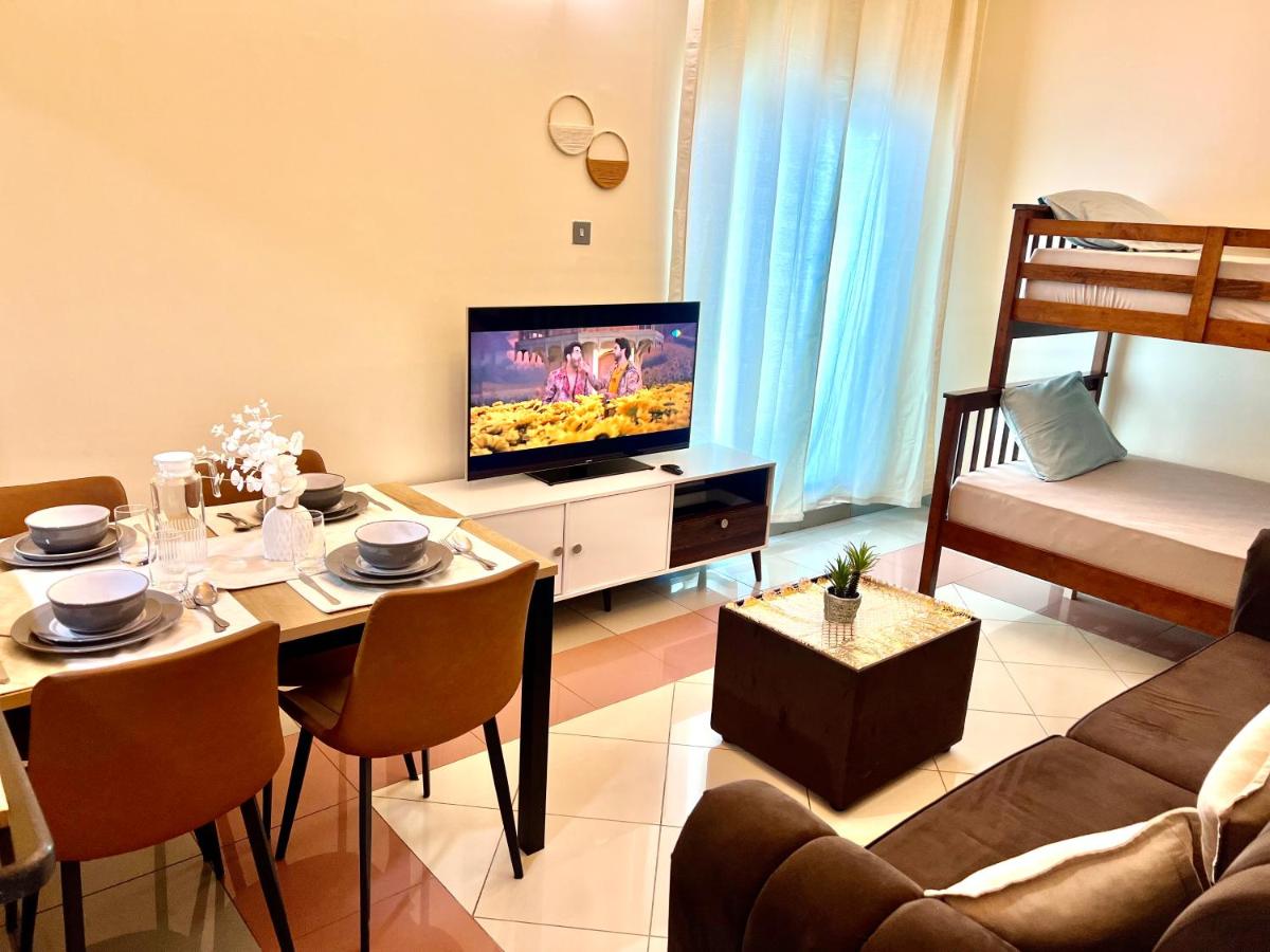 Cozy 1 Bedroom apartment in Dubai by Al Ghaimah Holiday Homes - B&B