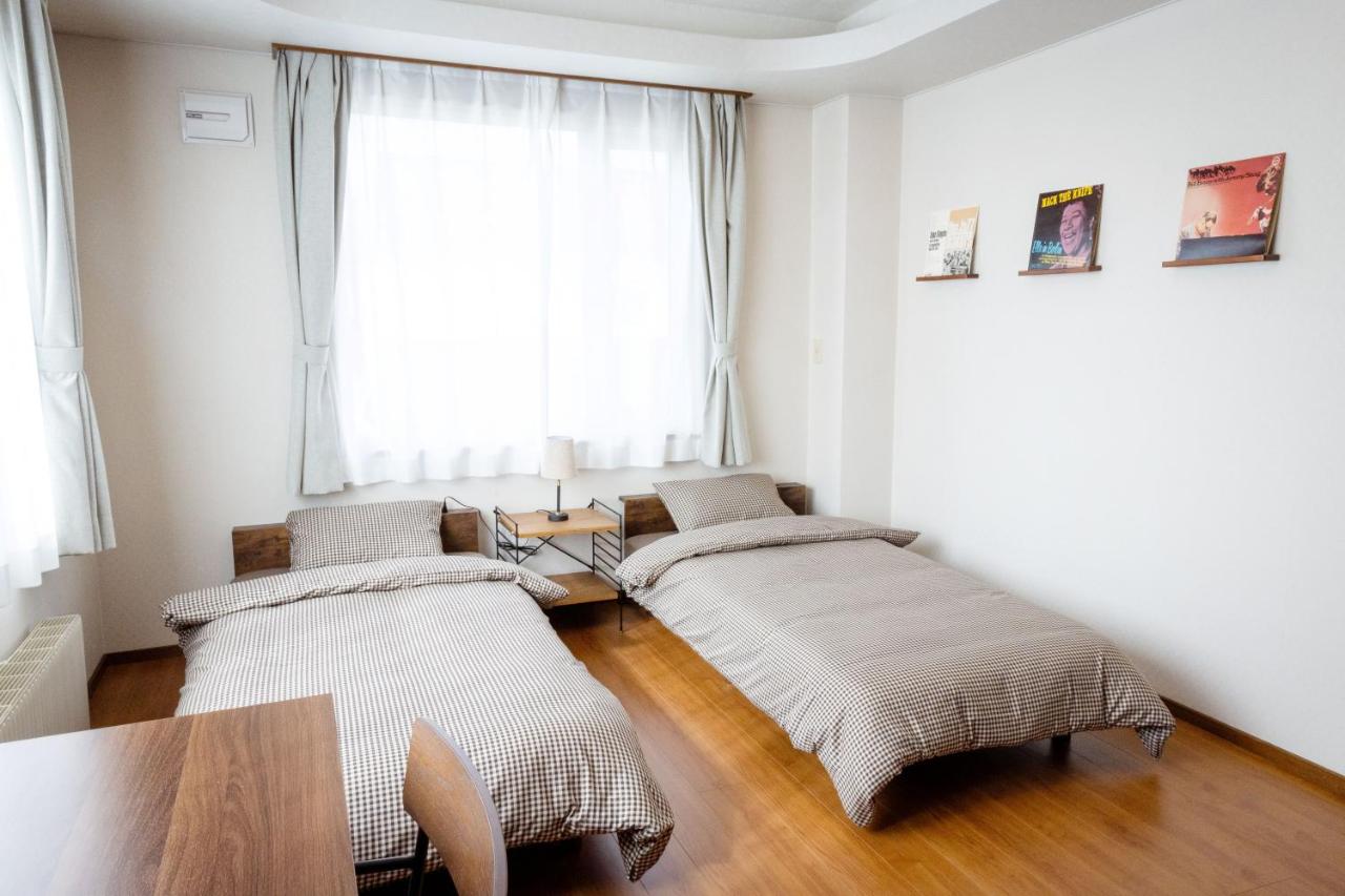 Twin Room with Shared Bathroom