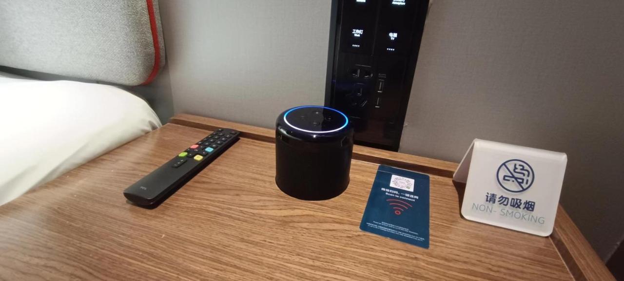 Black speaker with blue ring sits at dog-friendly Holiday Inn Express Nanning Convention And Exhibit by IHG in Nanning.