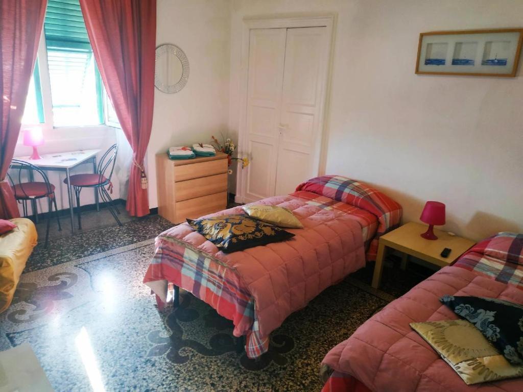 Camera Familiare con Bagno in Comune