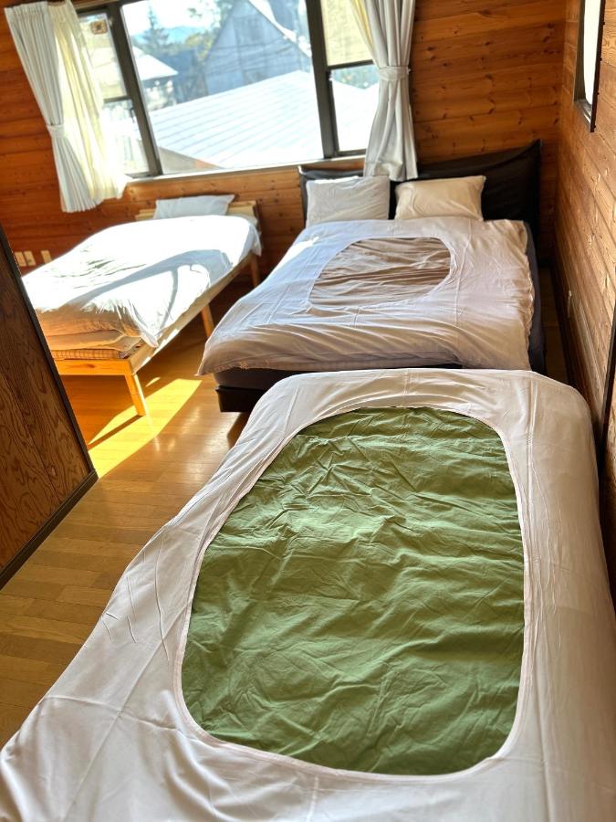 Quadruple Room with Shared Bathroom