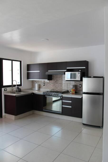 Casa moderna con terraza privada - B&B El Laurel