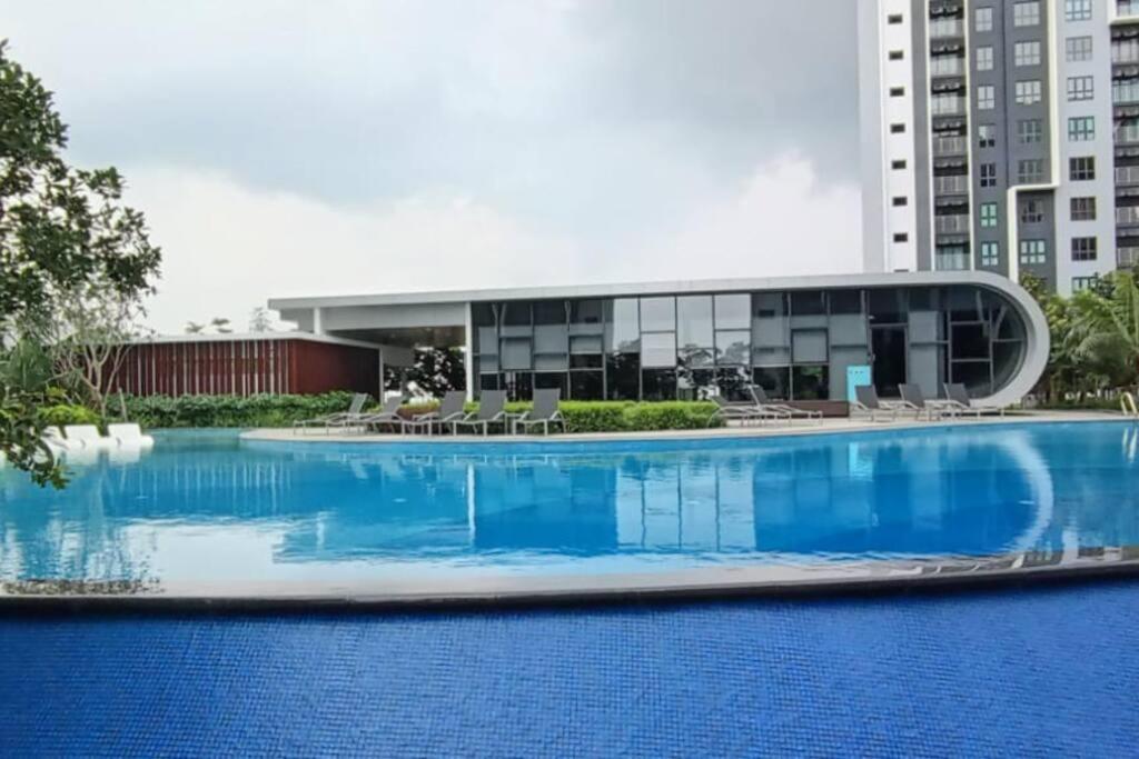 Iman RestHouse at Bandar Gamuda Cove - B&B