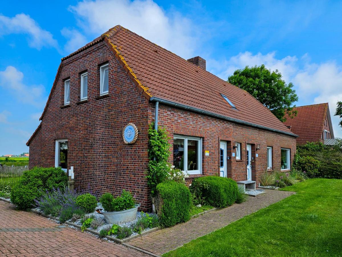 Ferienhaus Oll Smee 9 Huus EEN mit Terrasse, Grill und kleinem Garten - Bed and Breakfast