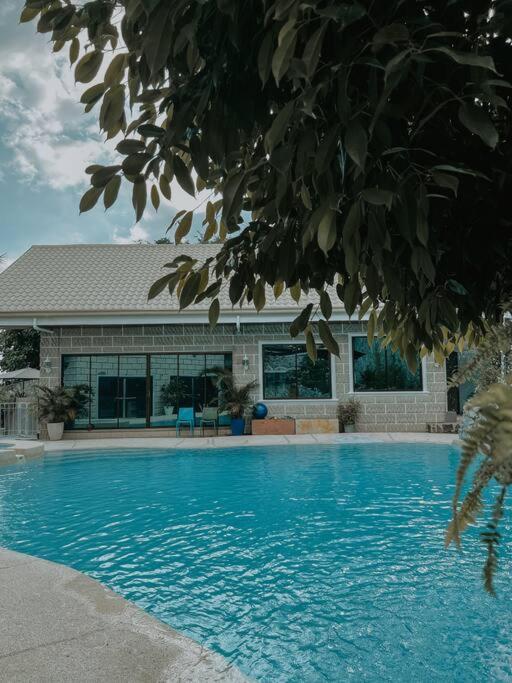 Casa Vista by Hooga Home Bungalow Guest House - Chambres d’hôtes Talisay