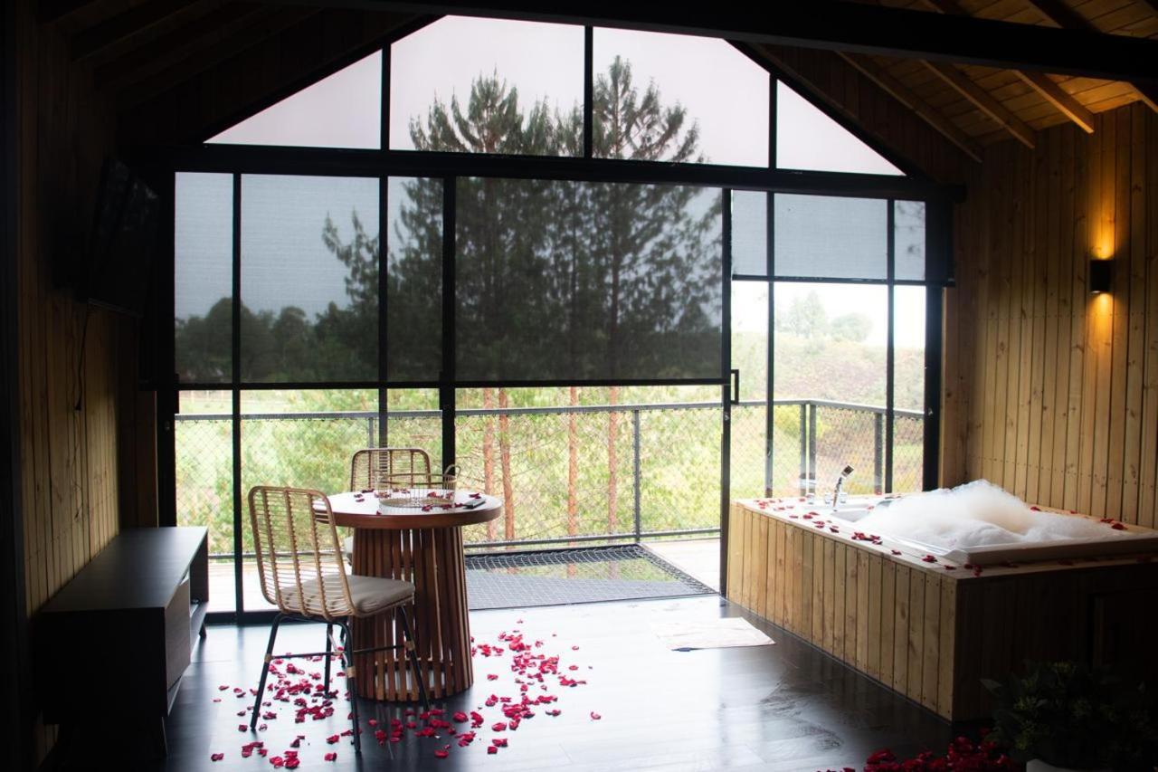 Ojo de Agua Cabañas en Guatapé - B&B Guatapé