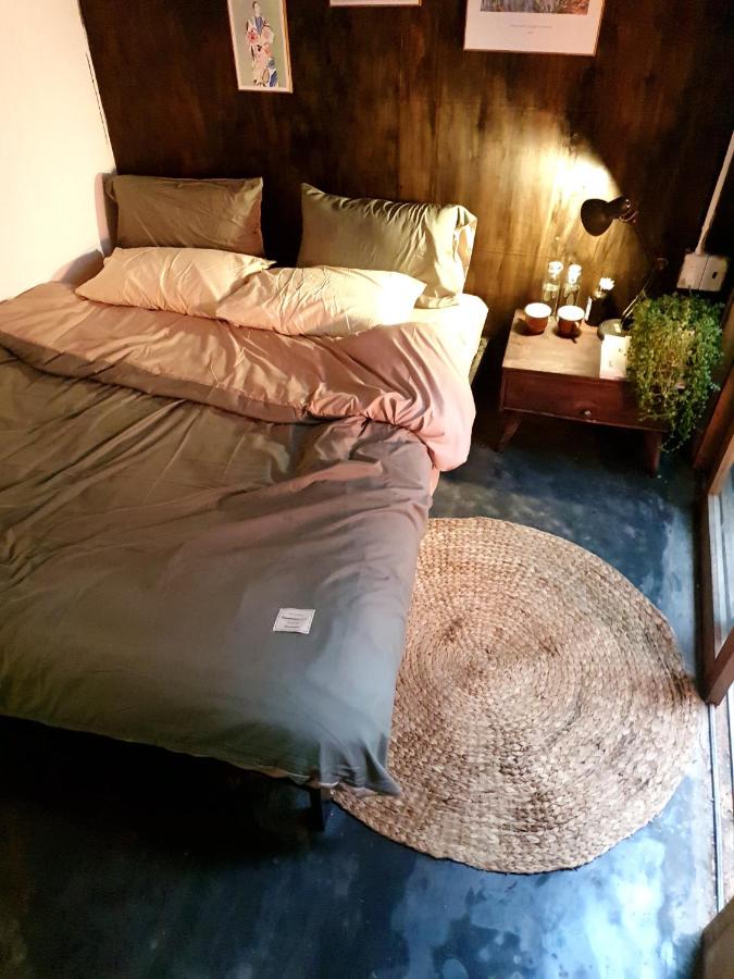 Kamer met Queensize Bed en Uitzicht op de Tuin