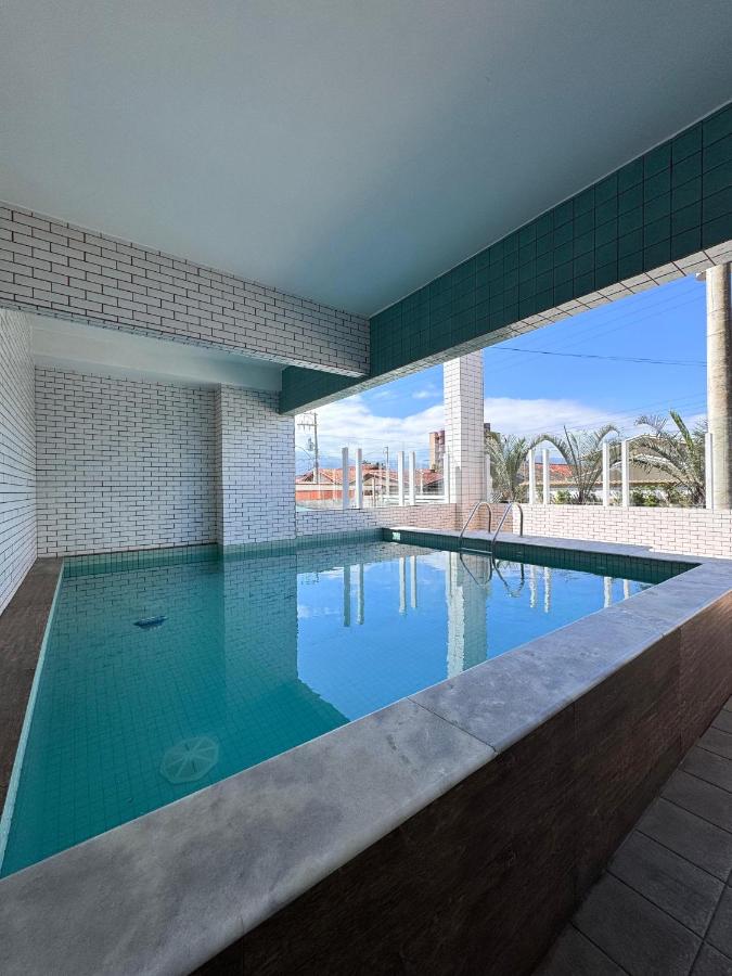 Apartamento na Praia Grande - Chambres d’hôtes
