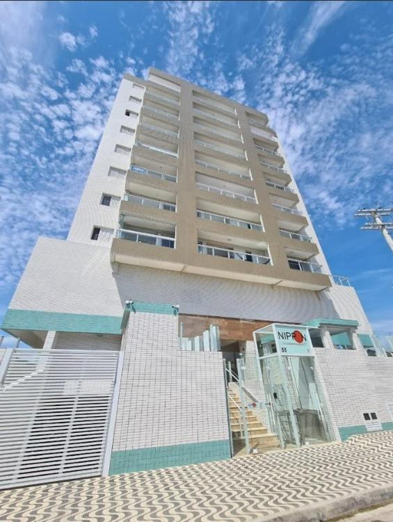 Cantinho Sol & Mar Pé na Areia frente ao Mar com churrasqueira na sacada e piscina - Chambres d'hôtes Praia Grande