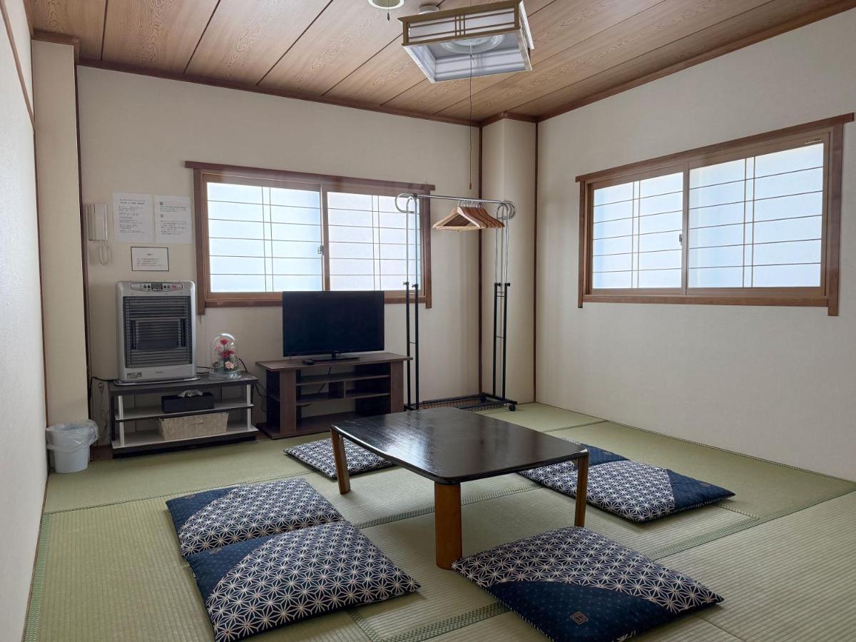 Quadruple Room with Shared Bathroom