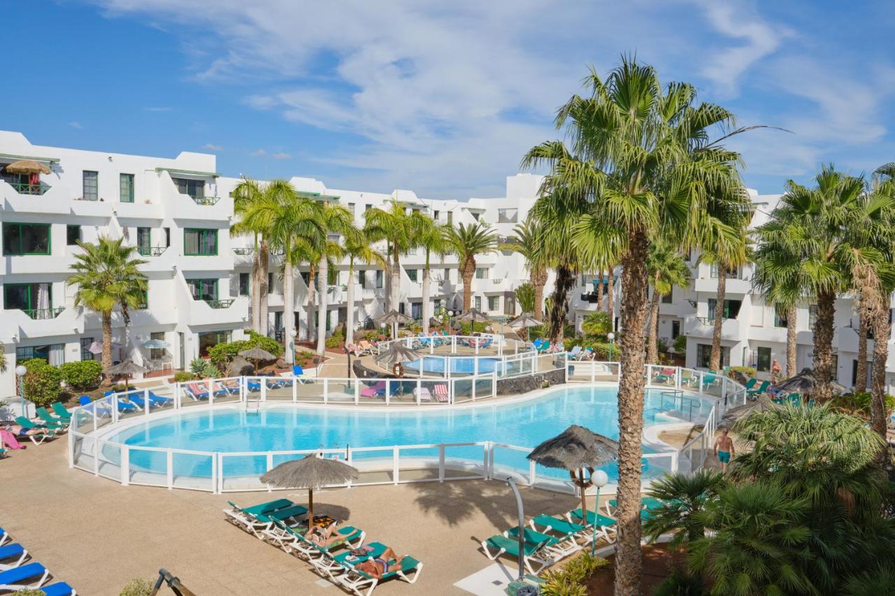 TOP FLOOR OCEAN VIEWS Lanzamar - Renovated Gem with a Sunny, Private Terrace & Elevator & Pool - Puerto del Carmen - Ferienwohnung