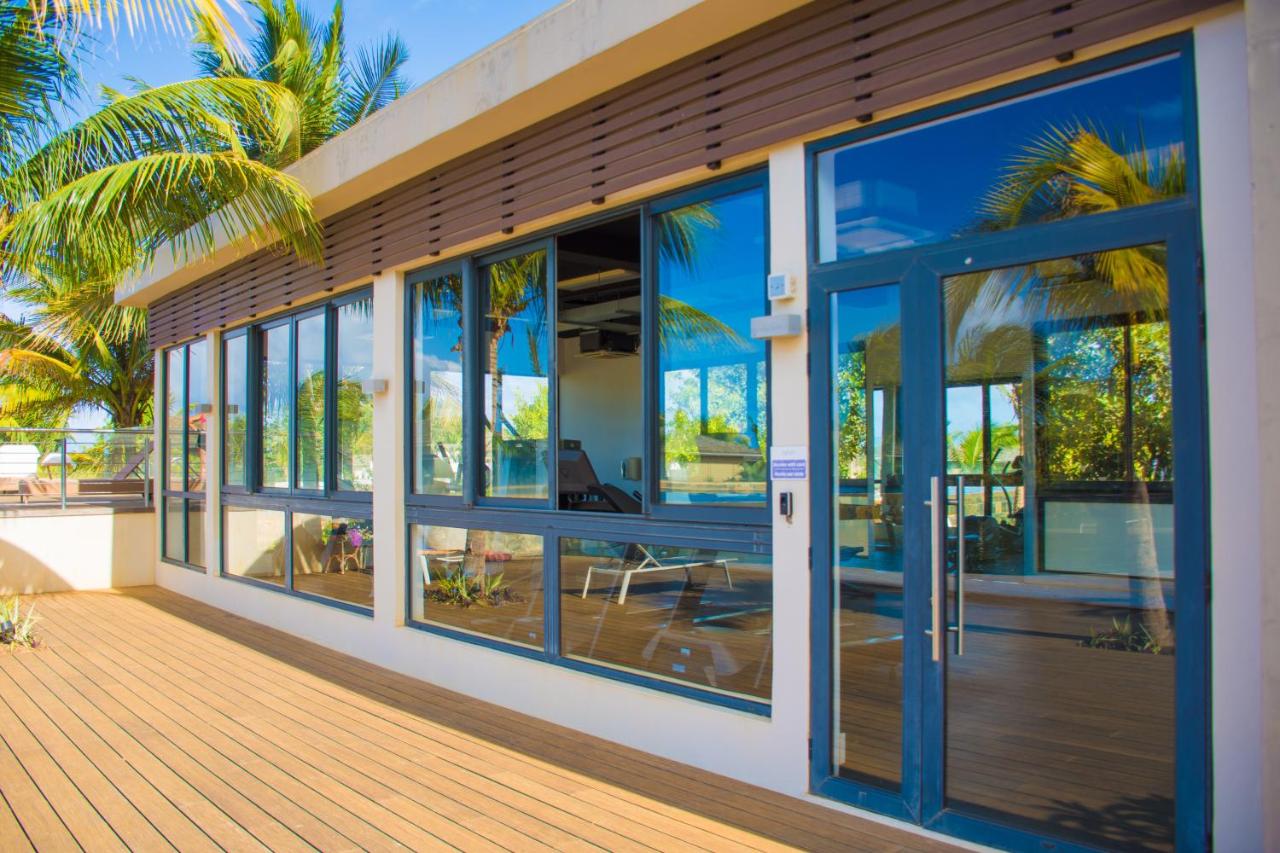 Azuri Apartment with Beach, Pools, Gym, Golf, Shops, Restaurants, Spa, Boat activities, Tennis &Paddle court, kids corner - Chambres d'hôtes Roches Noire