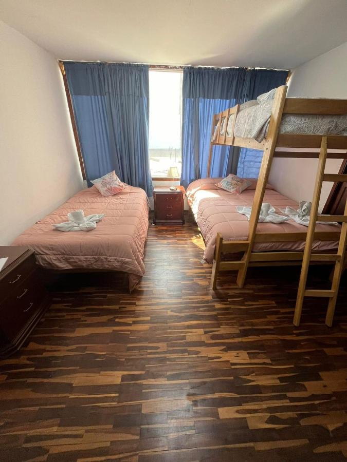 Camera Quadrupla con Bagno in Comune